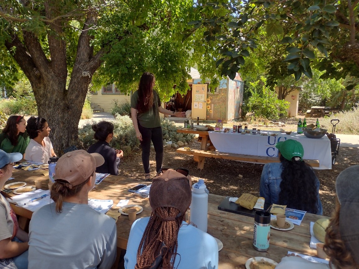 Olivia Henry talking to students about value-added farm products