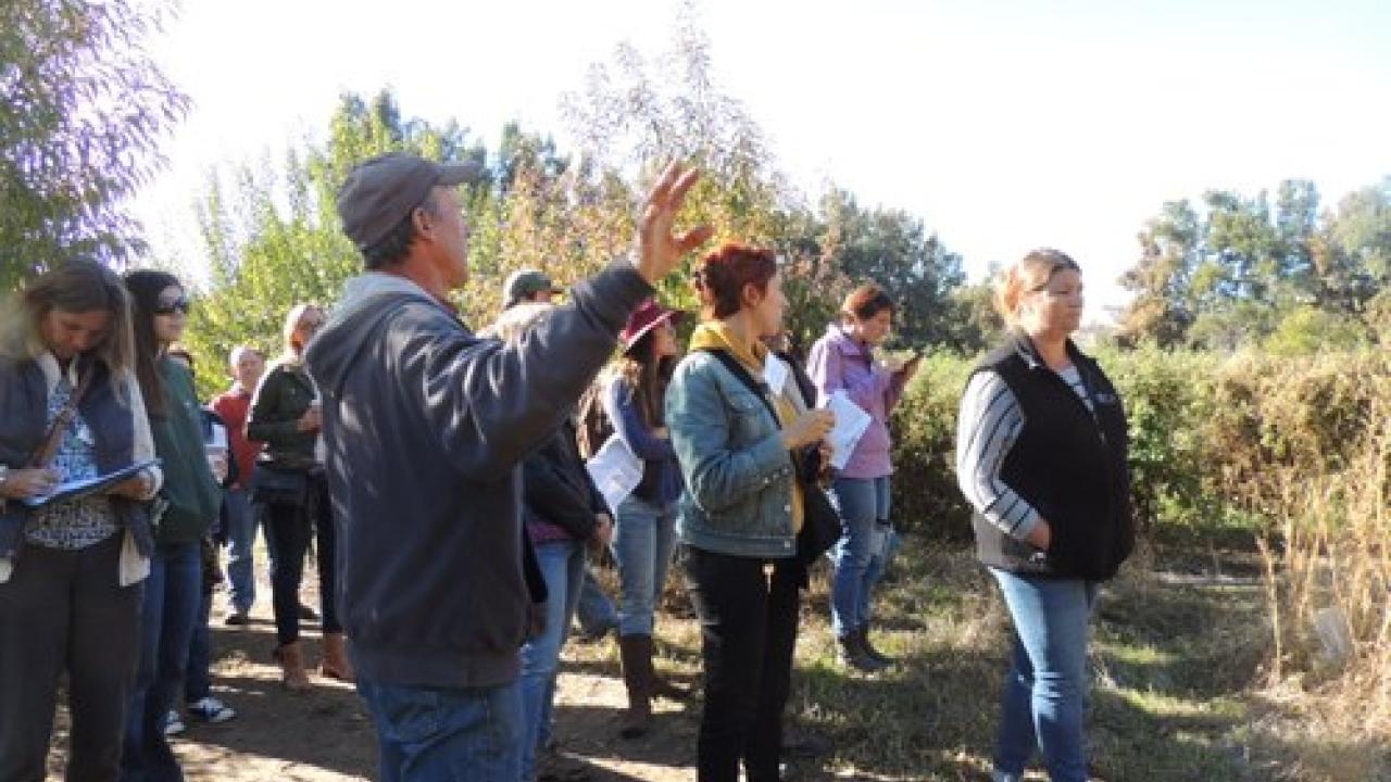 eff Main shows Good Humus Produce to Yolo County workshop participants